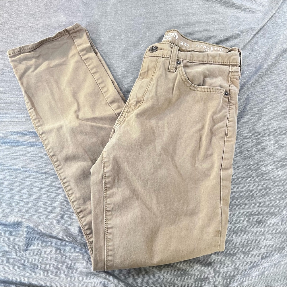 Denizen from Levi's Men's 241 Athletic Fit Stretch Jeans in Khaki 30x32